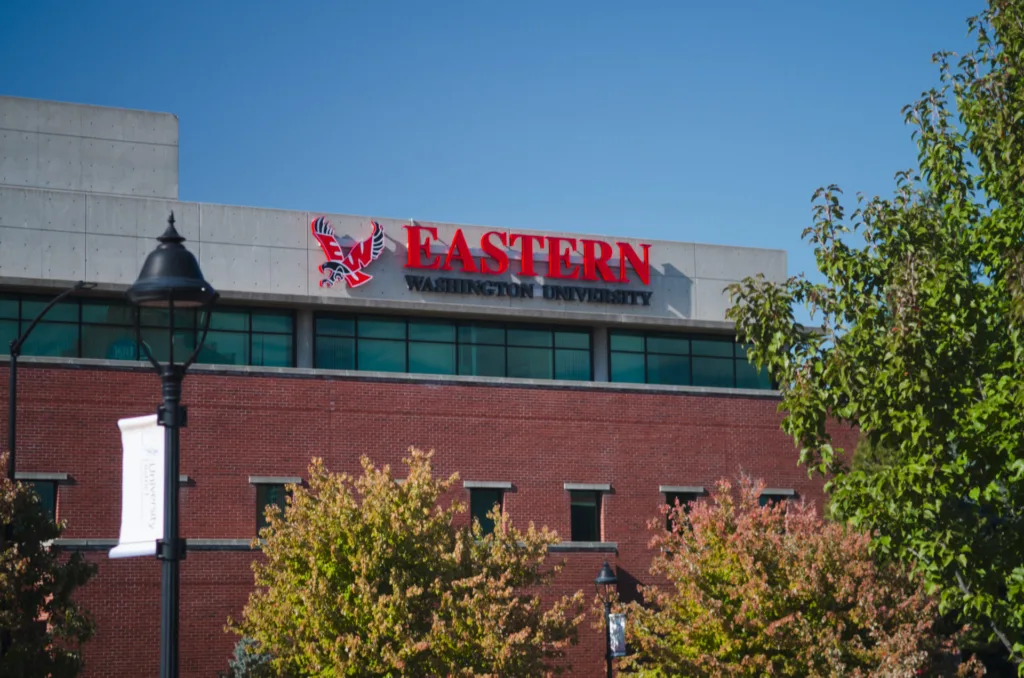 A photo of a building with Eastern Washington University's logo.